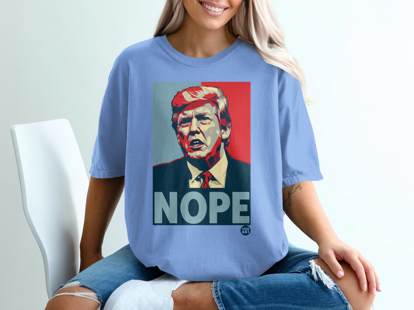 T-shirt with a portrait of Donald Trump and the word "NOPE."