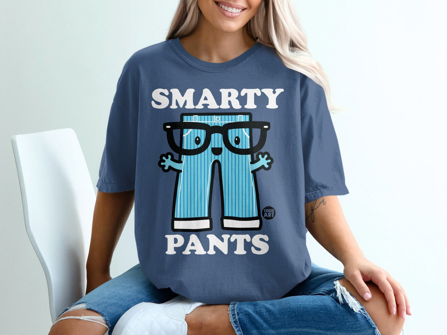 Blue t-shirt with "SMARTY PANTS" text and cartoon pants graphic.