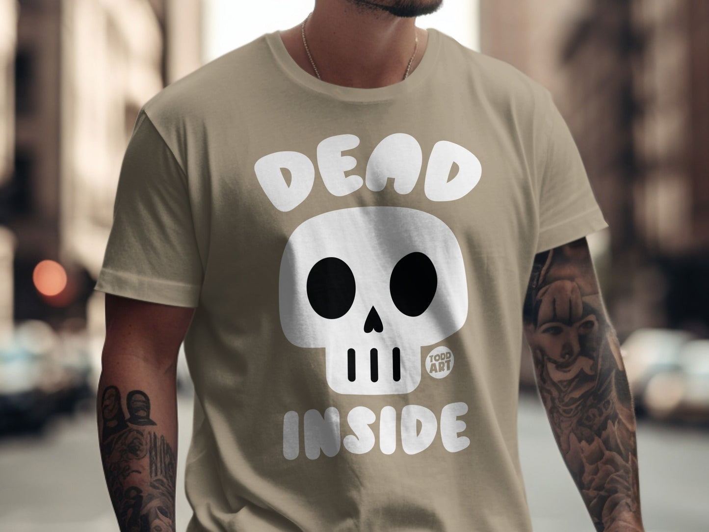 Khaki t-shirt with "DEAD INSIDE" and a skull graphic.