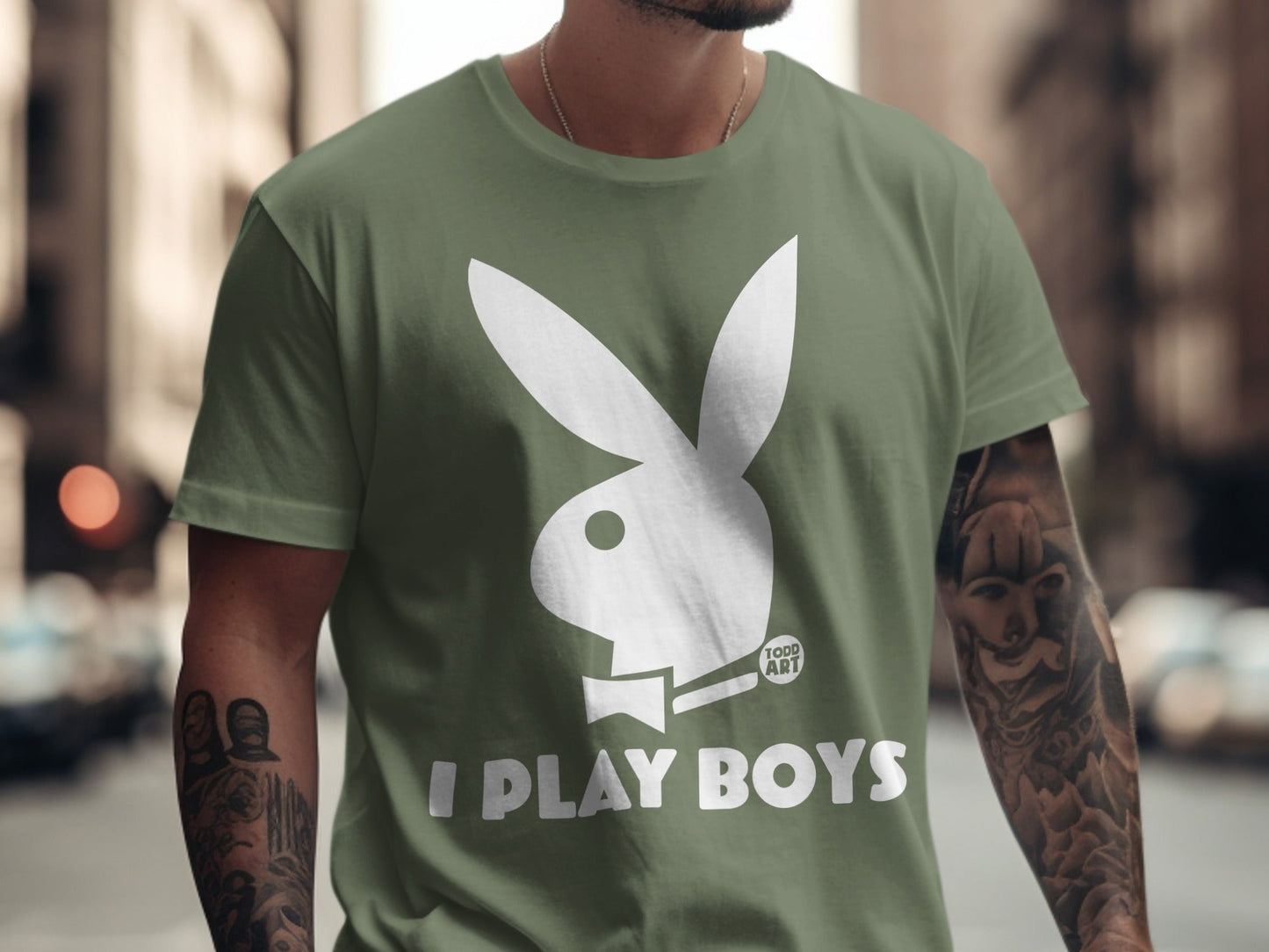 Green t-shirt with white Playboy bunny logo and "I PLAY BOYS" text.