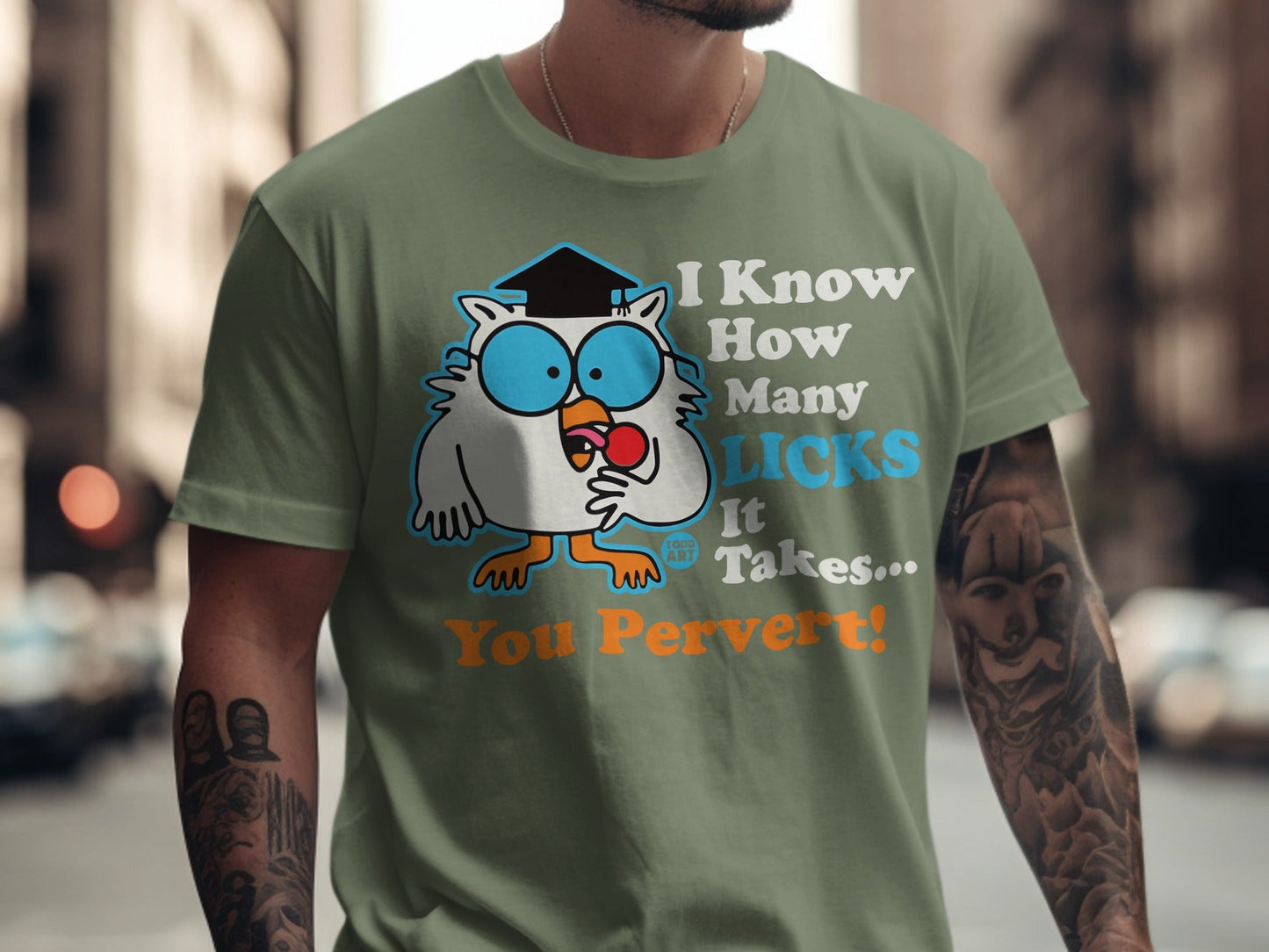 Owl wearing a graduation cap, holding a lollipop, with text "I Know How Many Licks It Takes... You Pervert!"