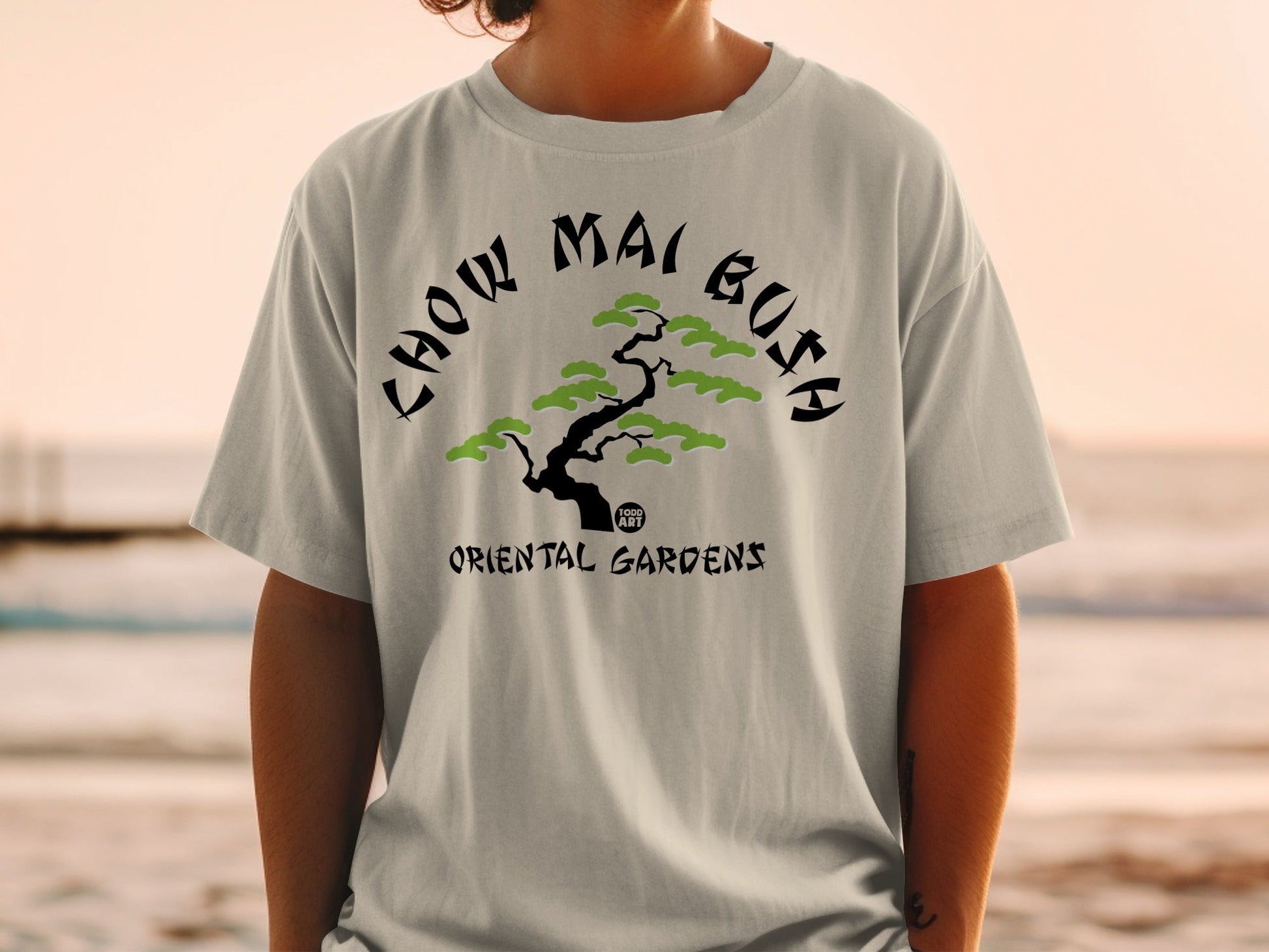 T-shirt with "Chow Mai" text and a stylized bonsai tree.