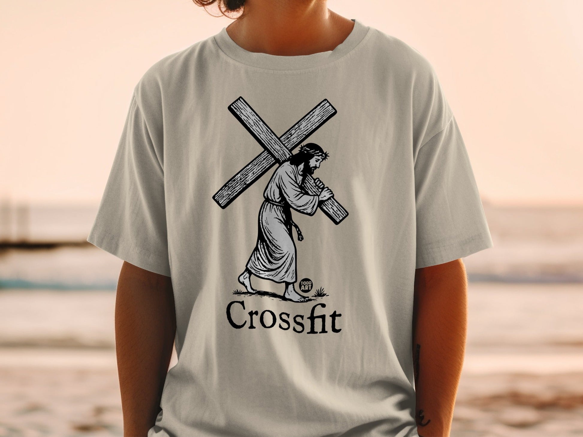 T-shirt graphic of Jesus carrying a cross with "Crossfit" text.