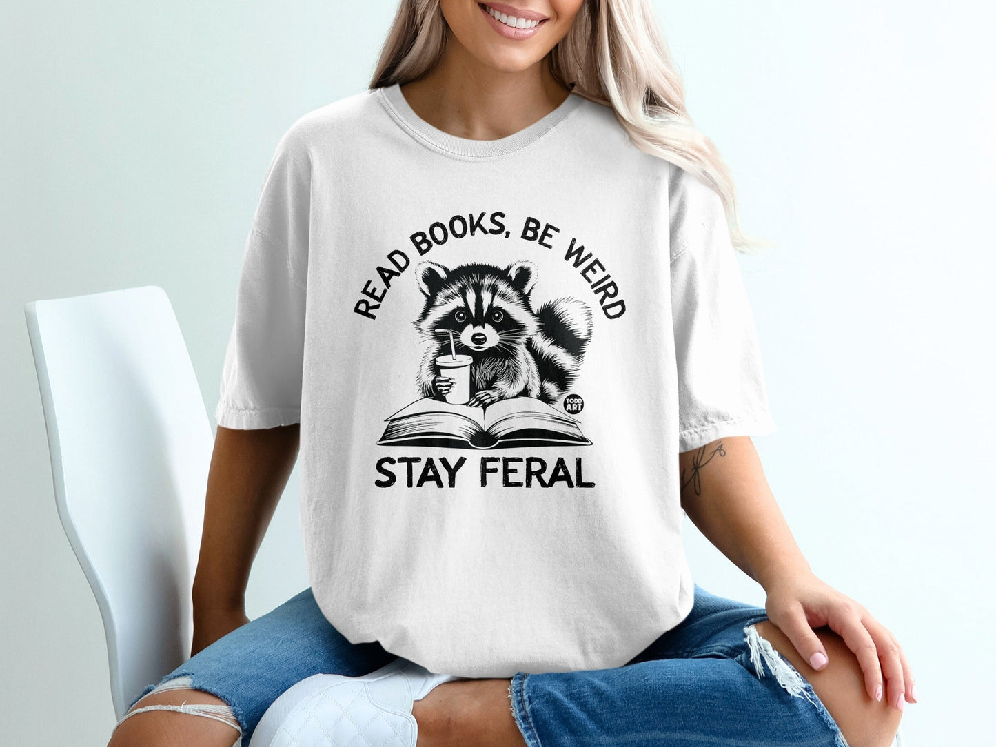 Read Books Be Weird Stay Feral Graphic T-Shirt