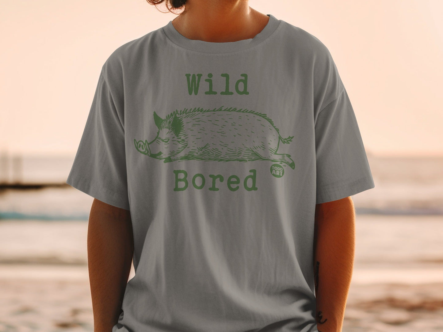 T-shirt with a wild boar illustration and text "Wild Bored".