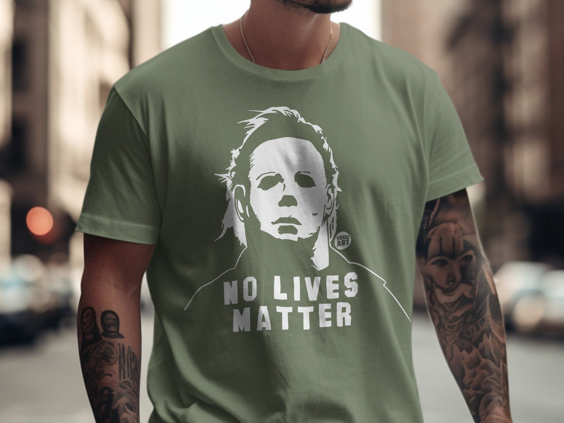Green t-shirt with Michael Myers graphic and "NO LIVES MATTER" text.