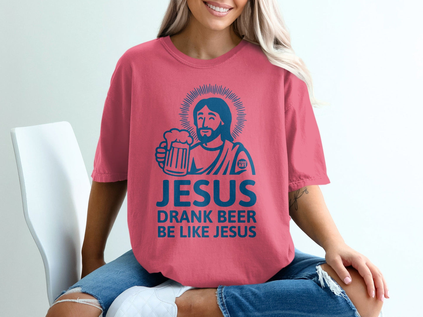 Jesus graphic t-shirt with "Jesus drank beer like Jesus" slogan.