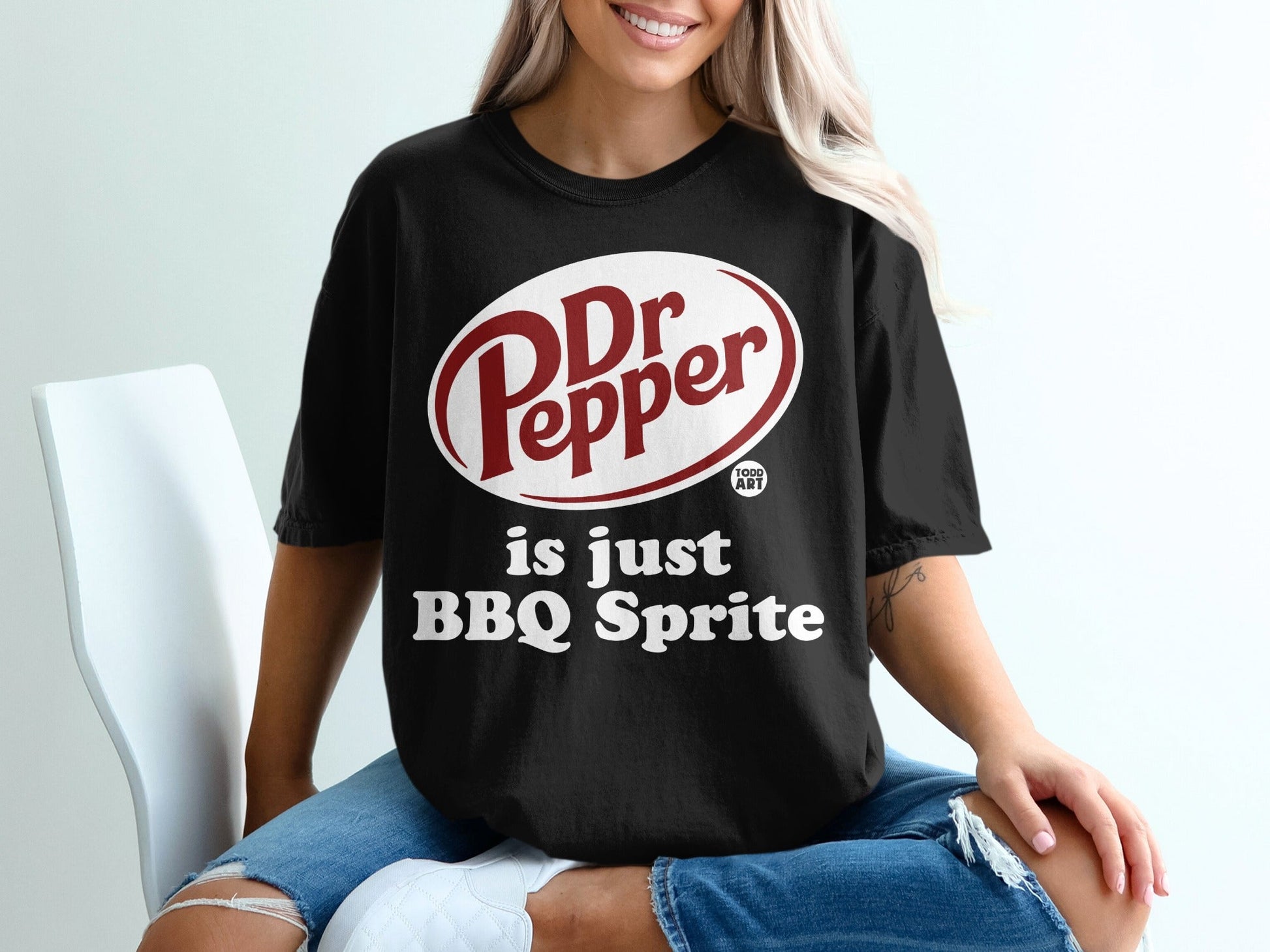 Black t-shirt with Dr Pepper logo and "is just BBQ Sprite" text.