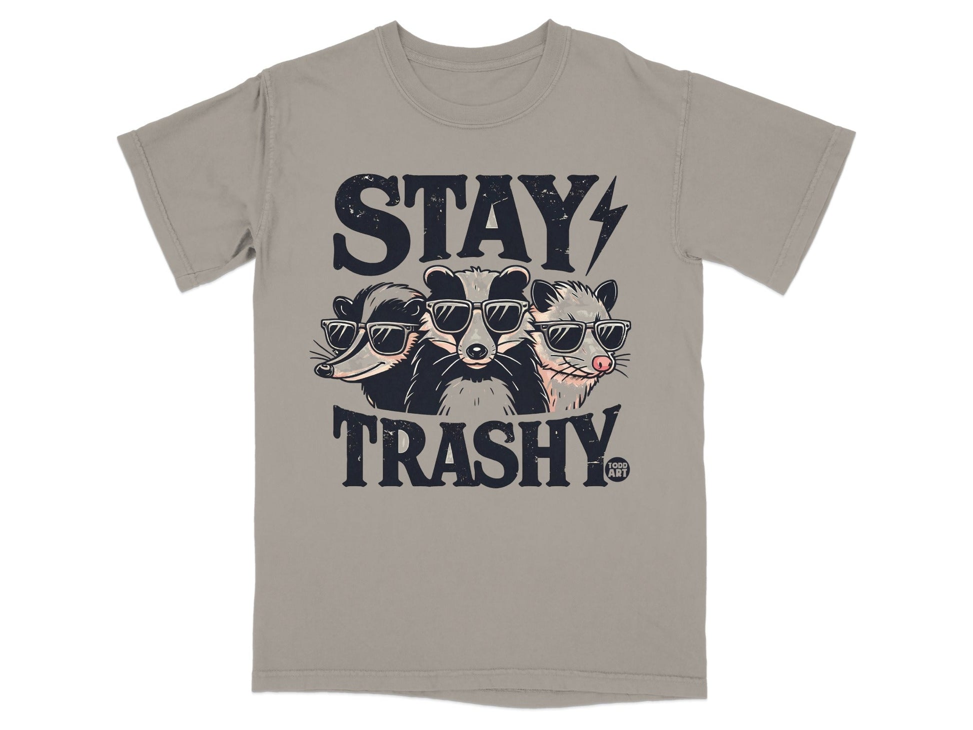 T-shirt graphic with raccoons and opossum wearing sunglasses, text "STAY TRASHY".