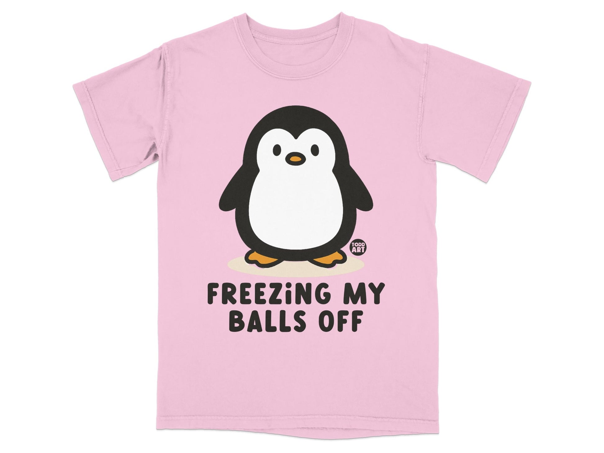 Pink t-shirt with a cartoon penguin that says "FREEZING MY BALLS OFF."