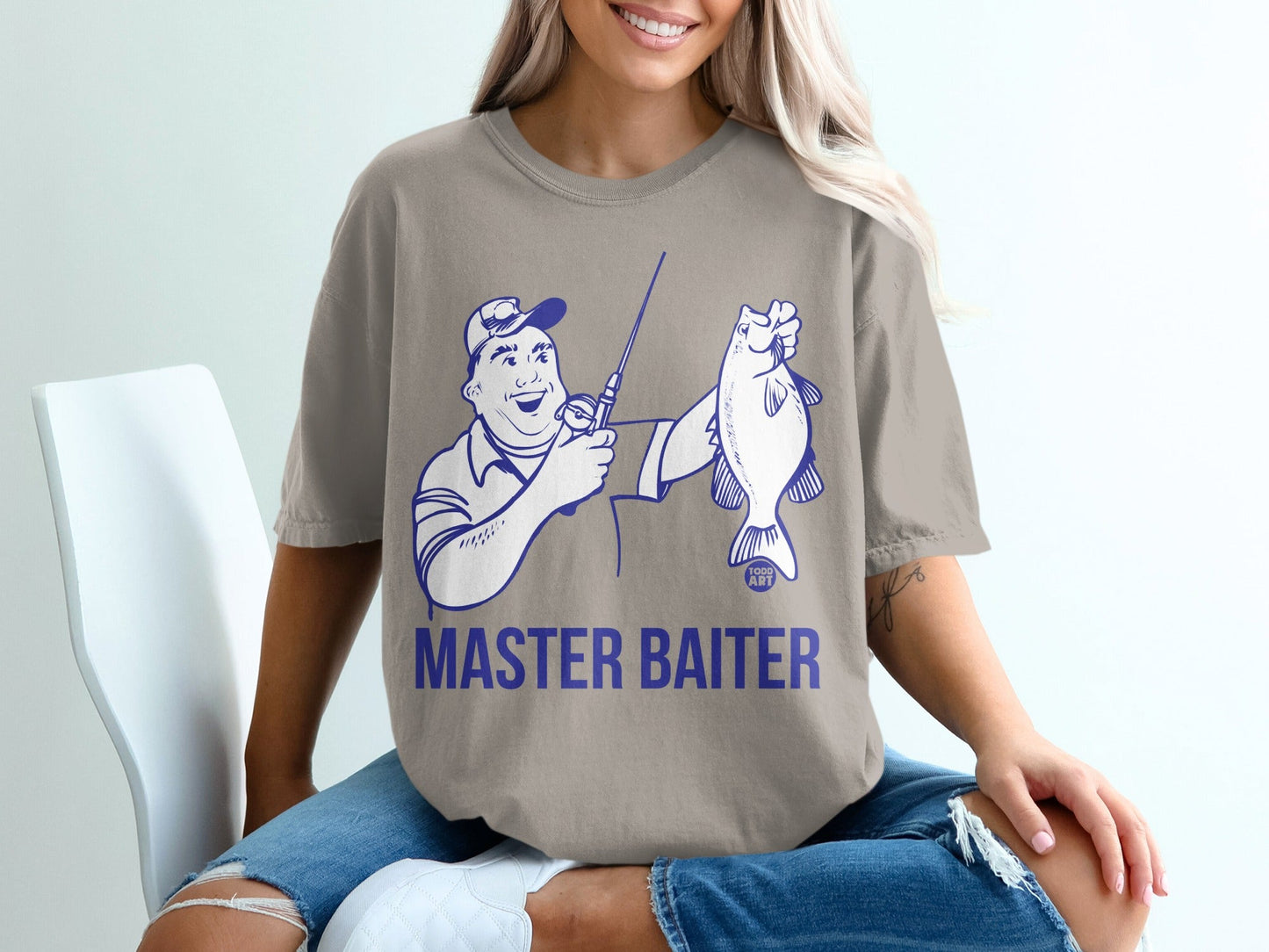 T-shirt with "MASTER BAITER" text and a cartoon of a man holding a fish.