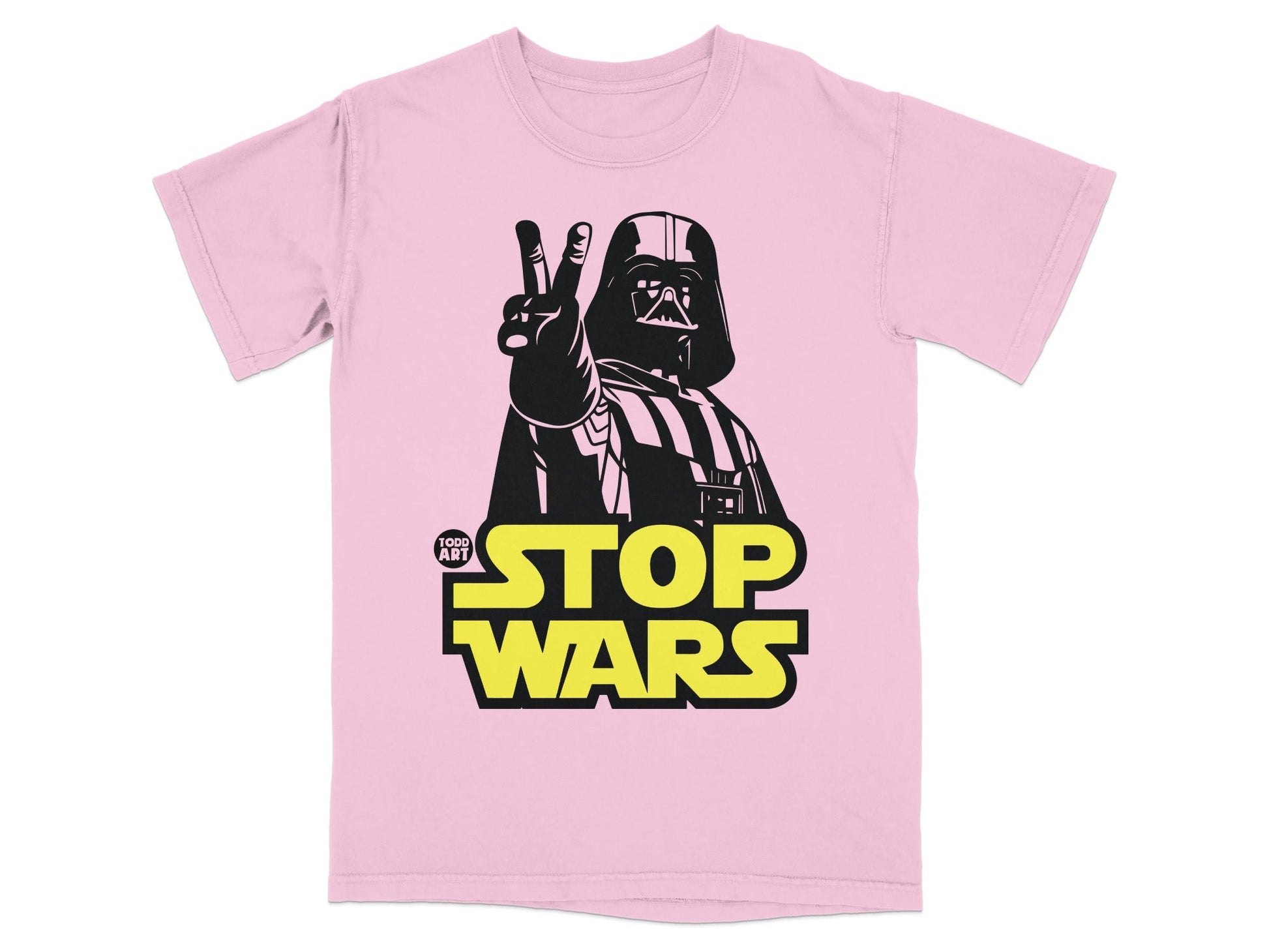 Darth Vader giving peace sign on pink t-shirt with "STOP WARS" text.