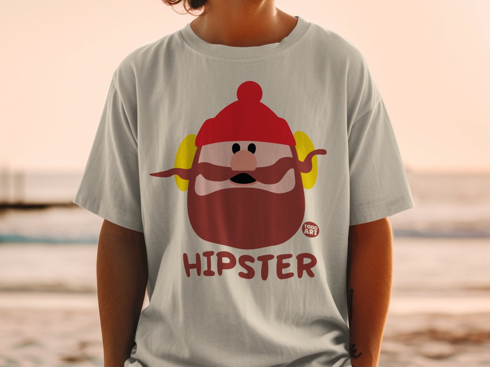 Cartoon hipster character on a t-shirt, with "Hipster" text.