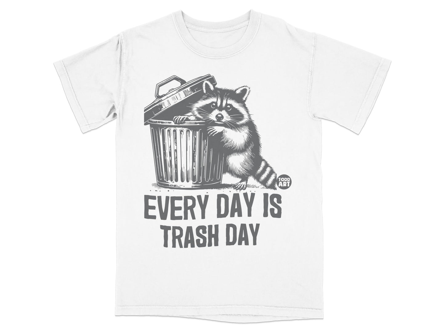 T-shirt featuring a raccoon peeking out of a trash can with text "EVERY DAY IS TRASH DAY".