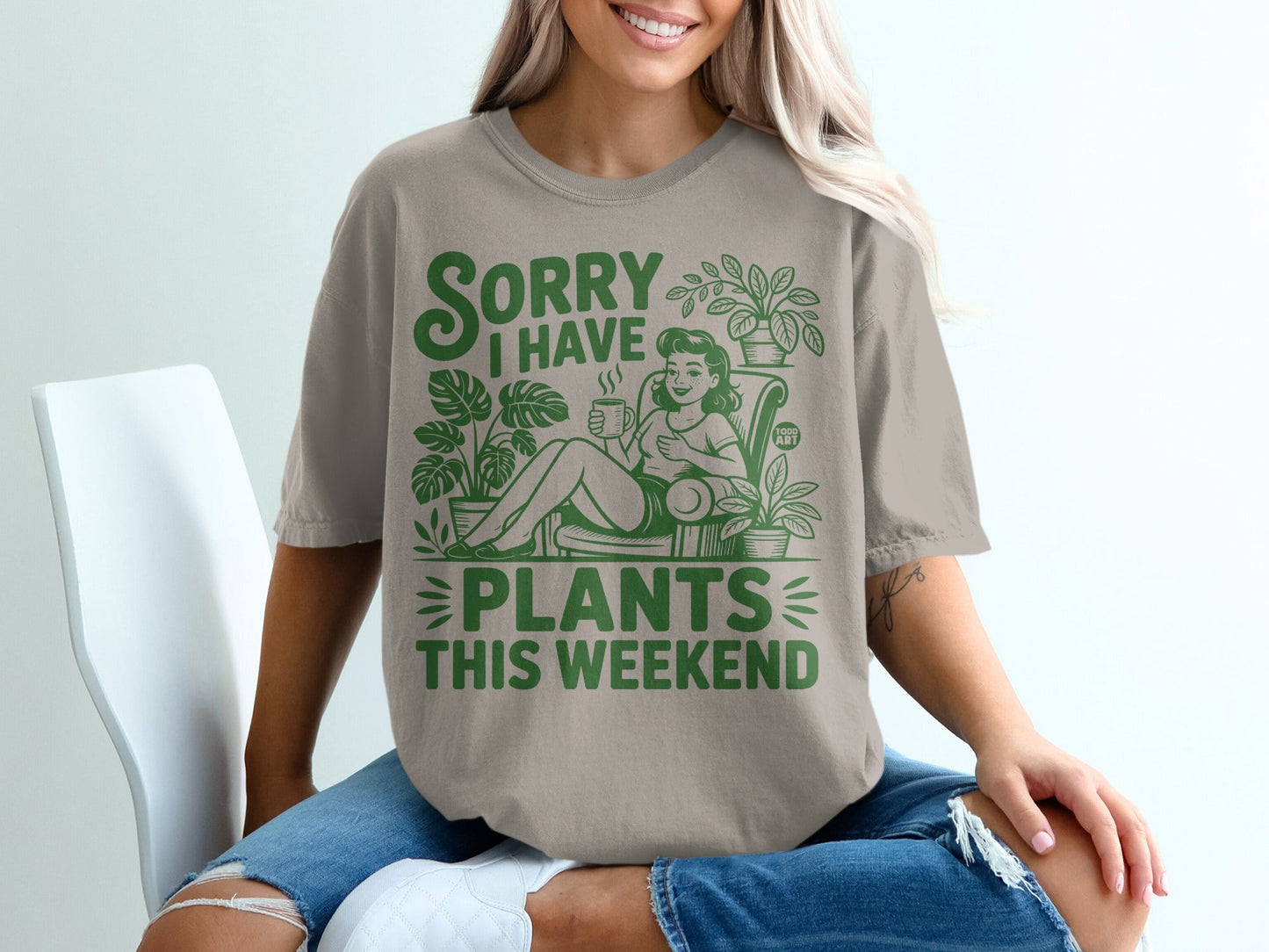 Comfortable graphic tee with "Sorry I have plants this weekend" text and botanical illustrations.