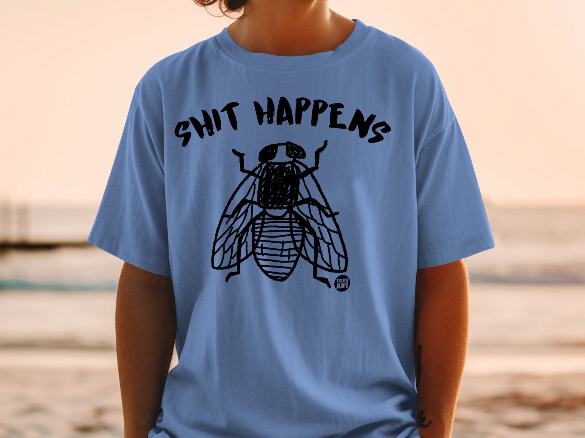 Shit Happens T-Shirt with Fly Illustration Graphic Tee