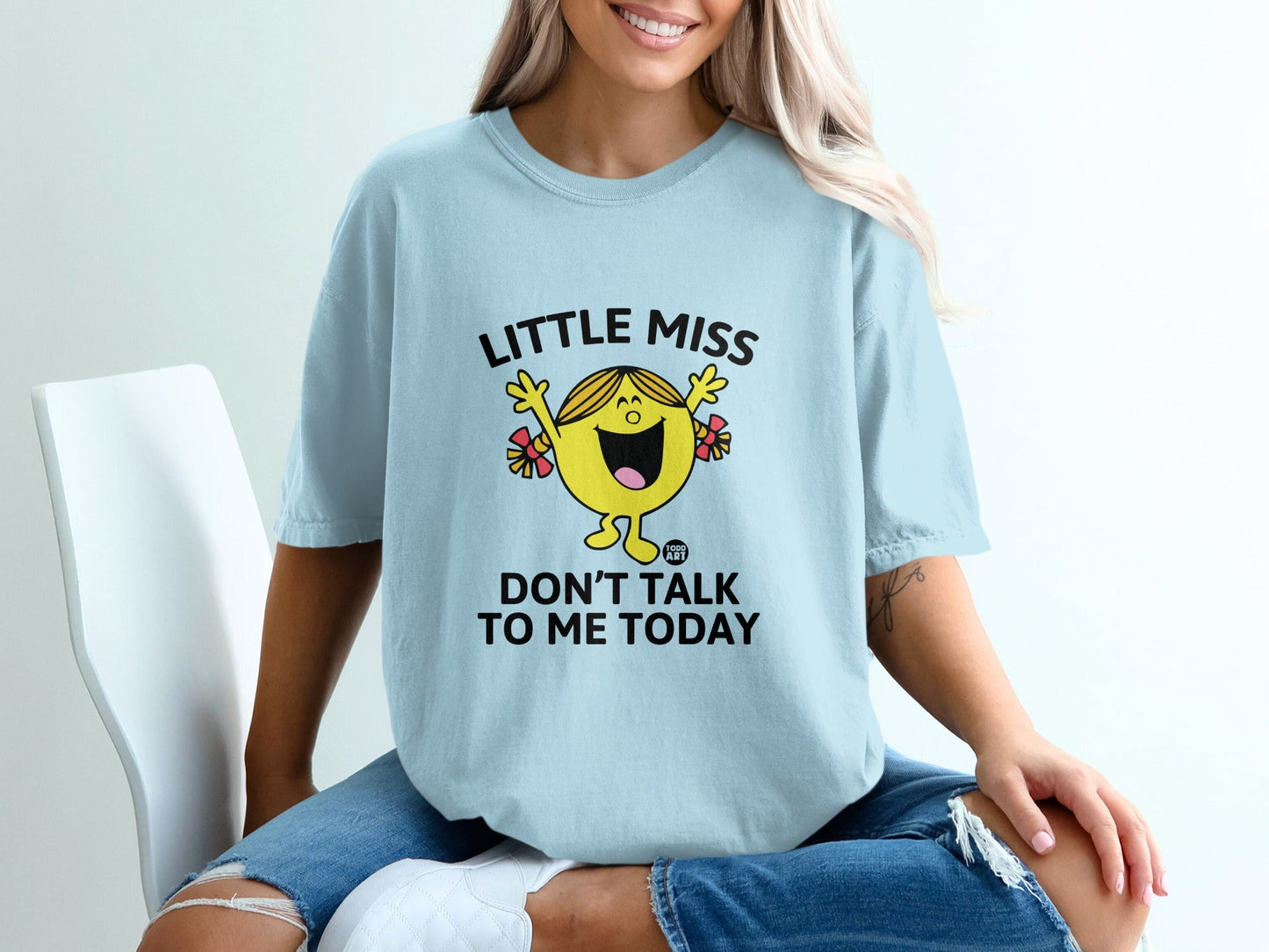 Light blue t-shirt with "Little Miss Don't Talk To Me Today" text and cartoon character.