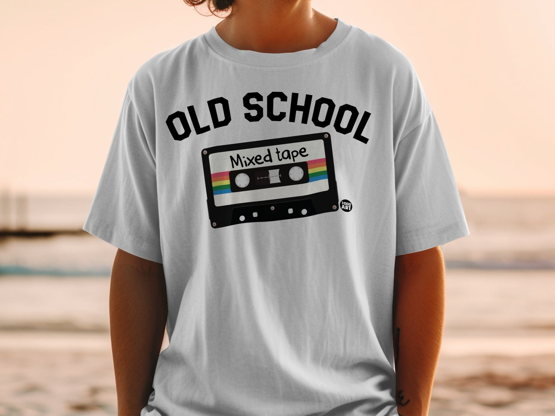 White t-shirt with "OLD SCHOOL Mixed tape" graphic featuring a cassette tape.