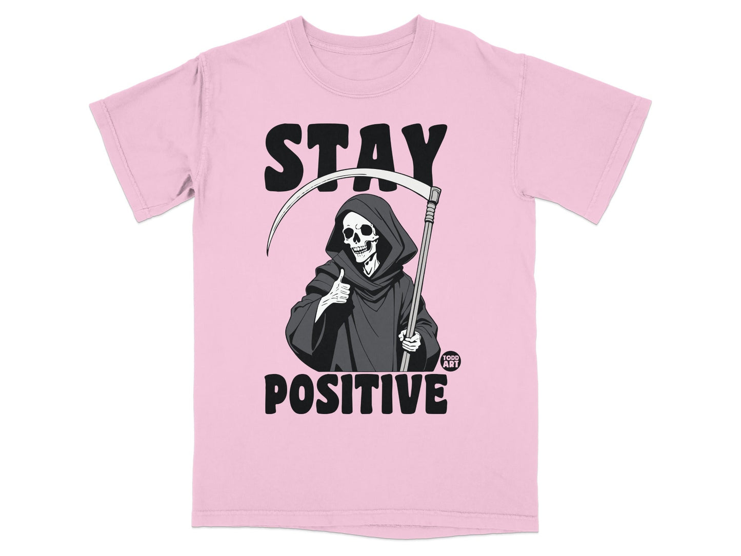 Pink t-shirt with Grim Reaper giving a thumbs up and "STAY POSITIVE" text.