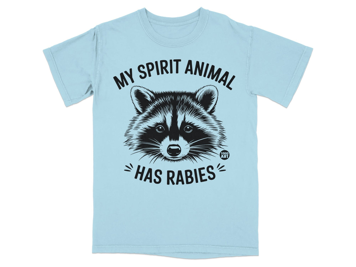 Light blue t-shirt with black raccoon graphic and "MY SPIRIT ANIMAL HAS RABIES" text.
