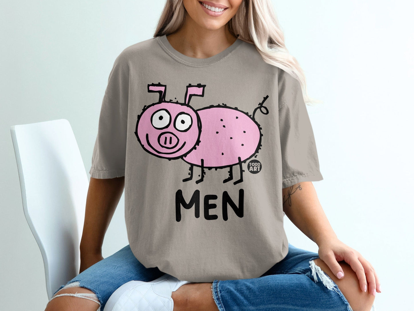 T-shirt with cartoon pig and "MEN" text.