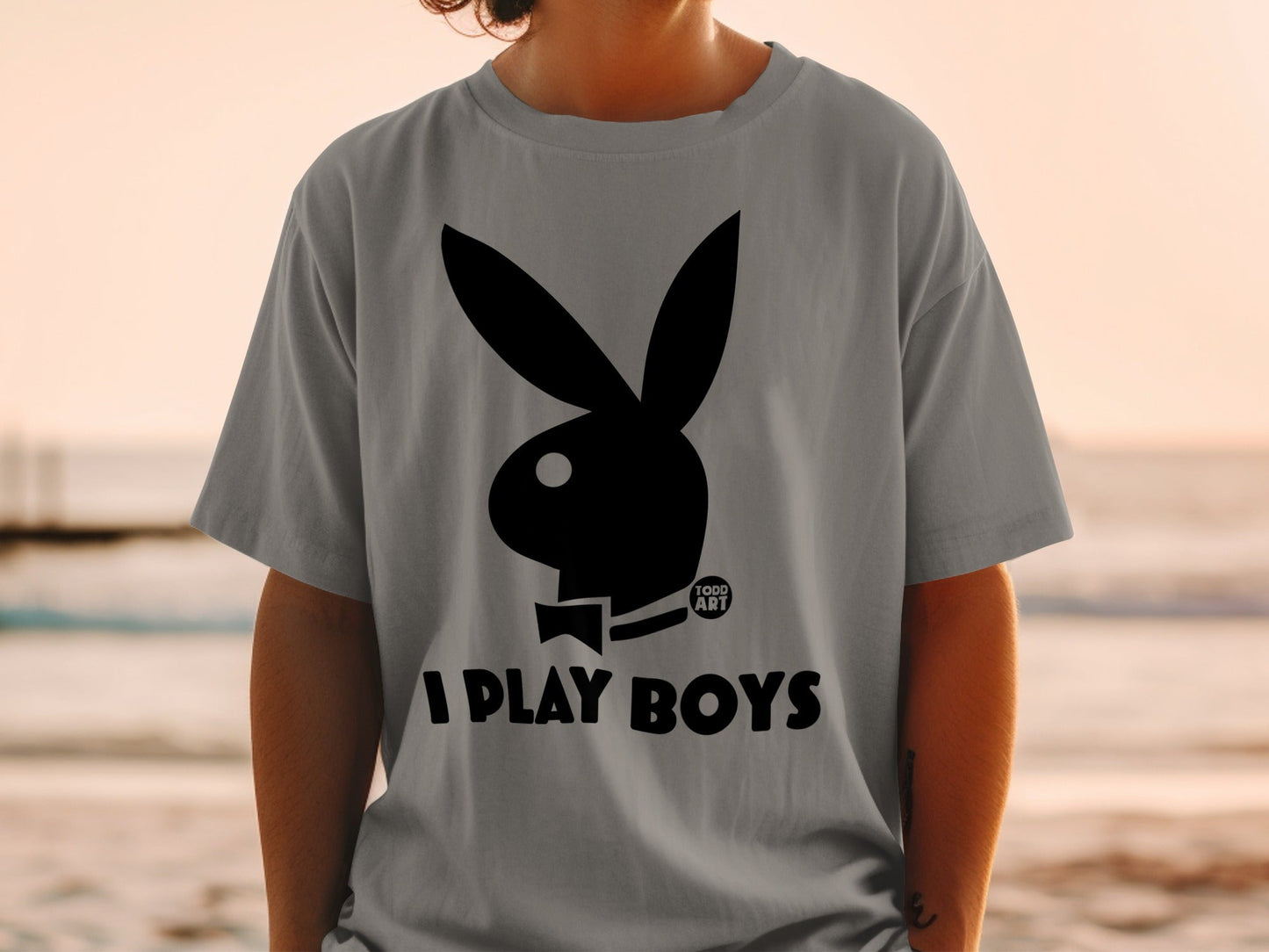 Gray t-shirt with black Playboy bunny logo and "I PLAY BOYS" text.