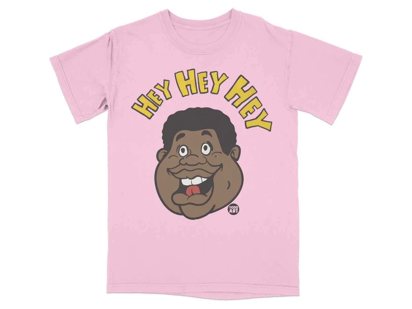Pink t-shirt with a cartoon face and "Hey Hey Hey" text.