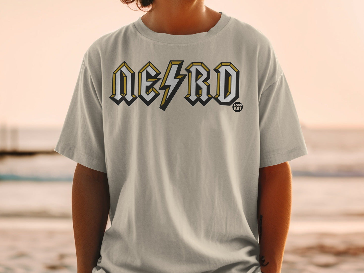 Light grey t-shirt with bold "NERD" logo in yellow and white.