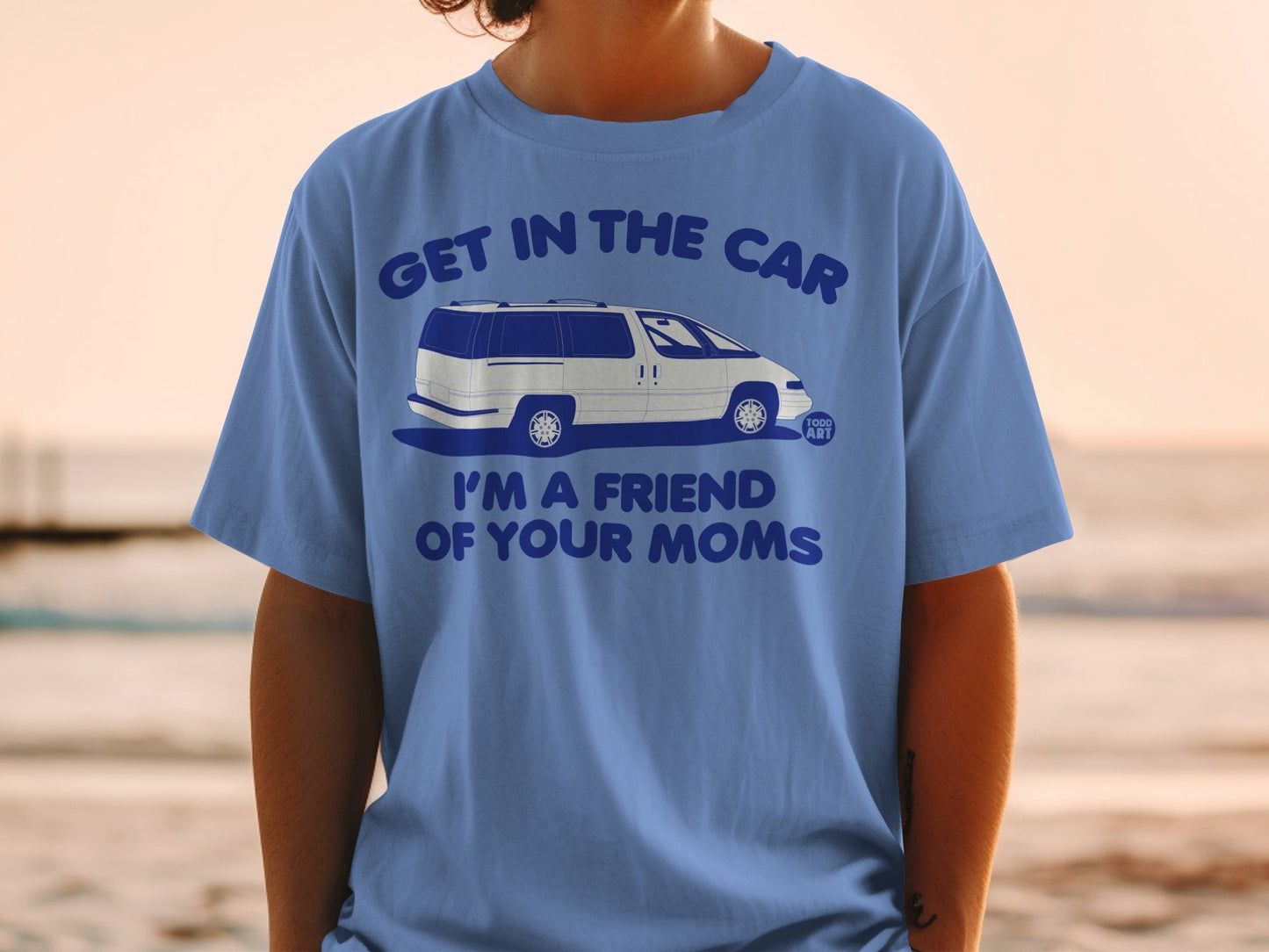 Blue t-shirt with white minivan and text "Get in the car, I'm a friend of your moms."
