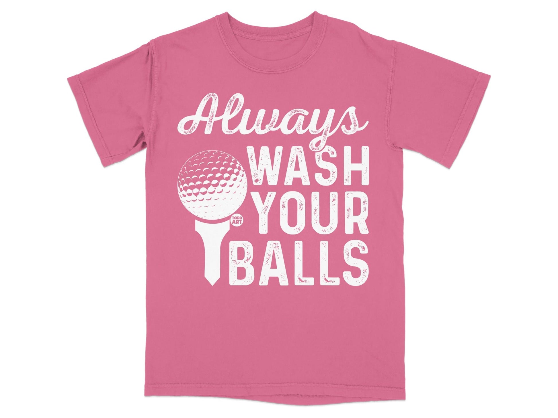 Pink t-shirt with white text and golf ball on tee: "Always Wash Your Balls".