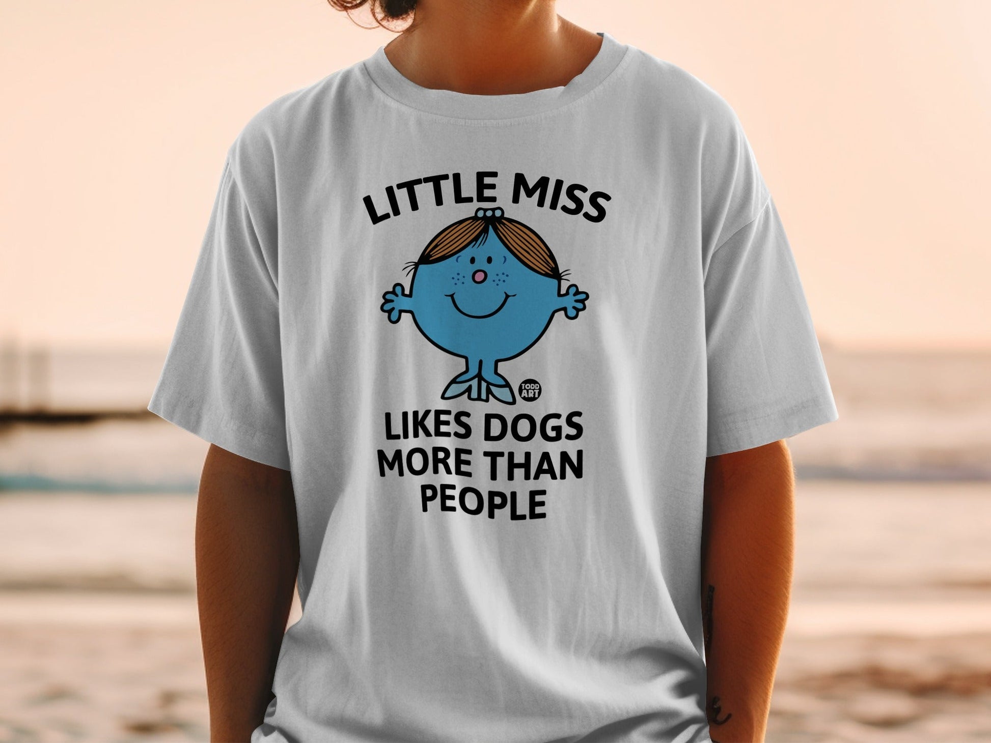 Little Miss character with text "LITTLE MISS LIKES DOGS MORE THAN PEOPLE".
