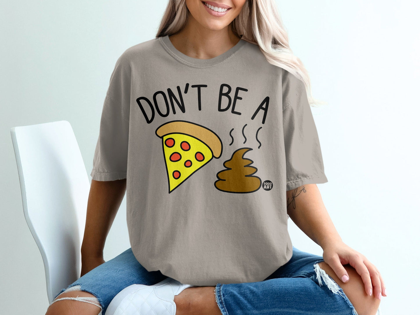 T-shirt with "DON'T BE A POO-ZA" pizza and poop graphic.