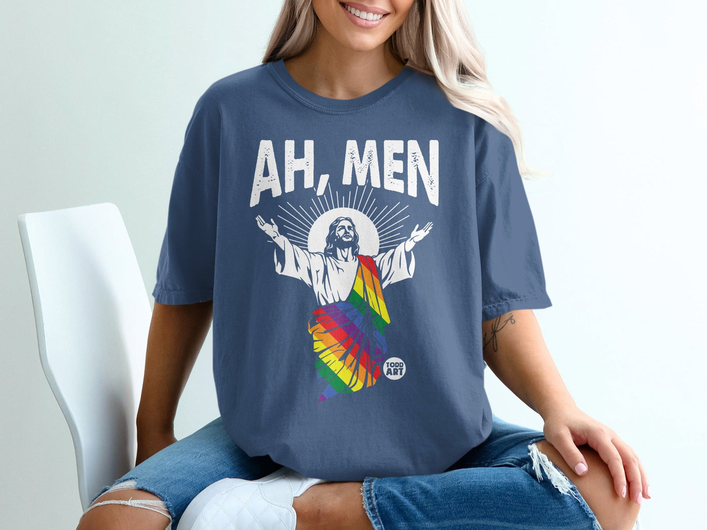 T-shirt with Jesus wearing a rainbow flag and "AH, MEN" text.