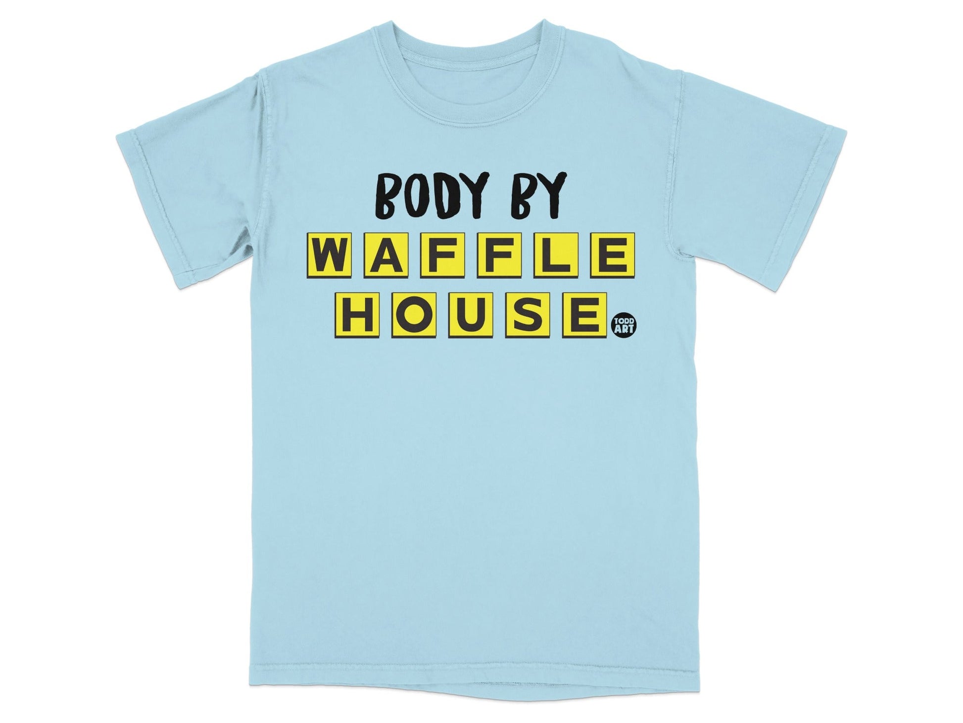 Light blue t-shirt with "BODY BY WAFFLE HOUSE" spelled out in yellow Scrabble tiles.