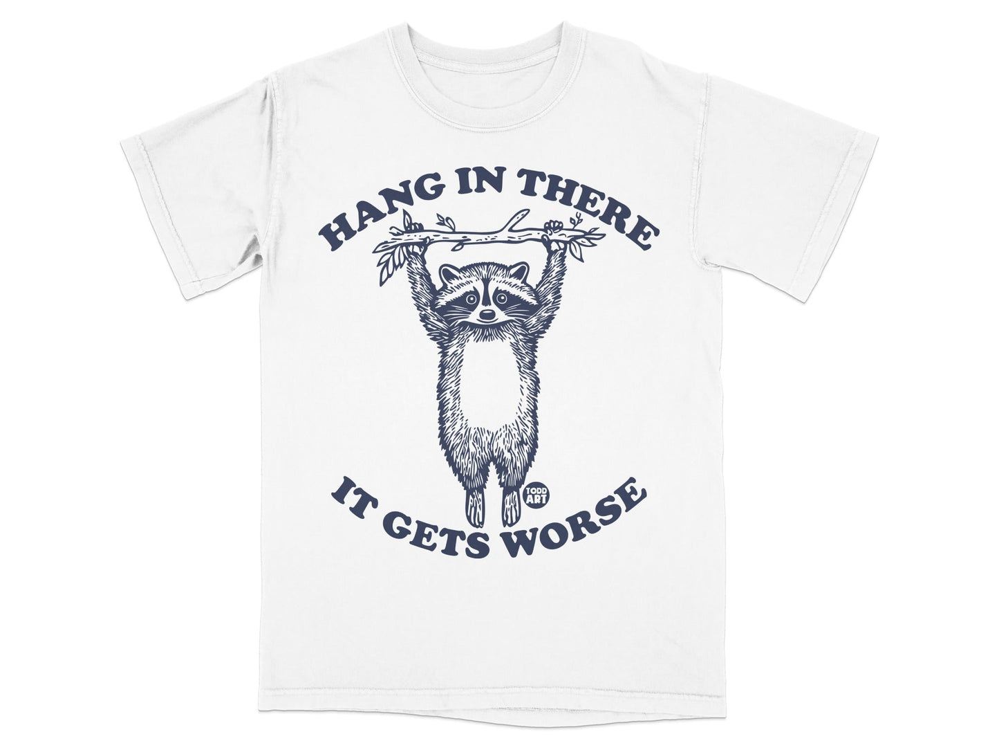T-shirt graphic of a raccoon hanging from a branch with text "Hang in there, it gets worse."