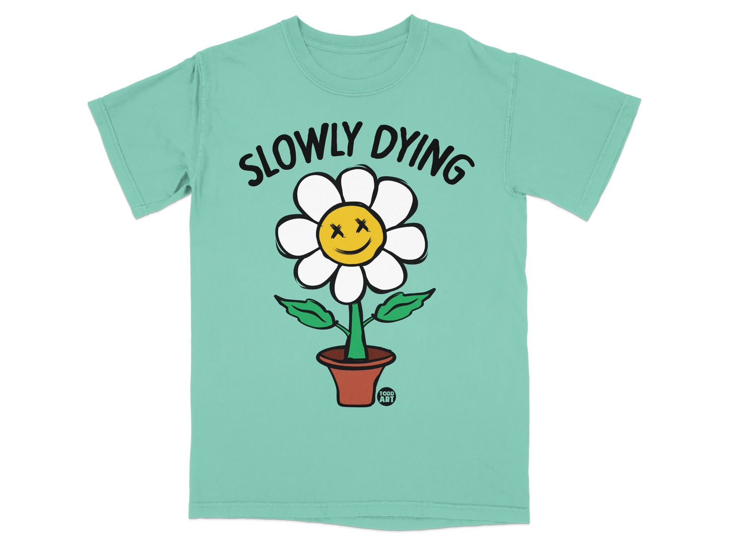 T-shirt with a smiling daisy in a pot, text reads "SLOWLY DYING."