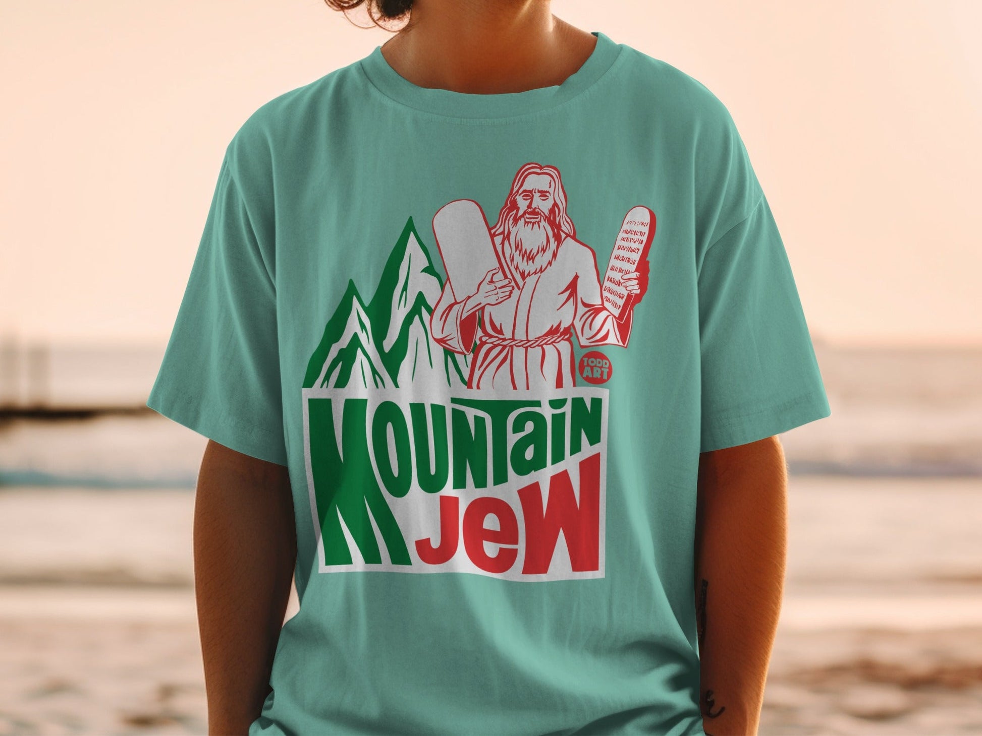 T-shirt with "Mountain Jew" design featuring Jesus holding tablets.
