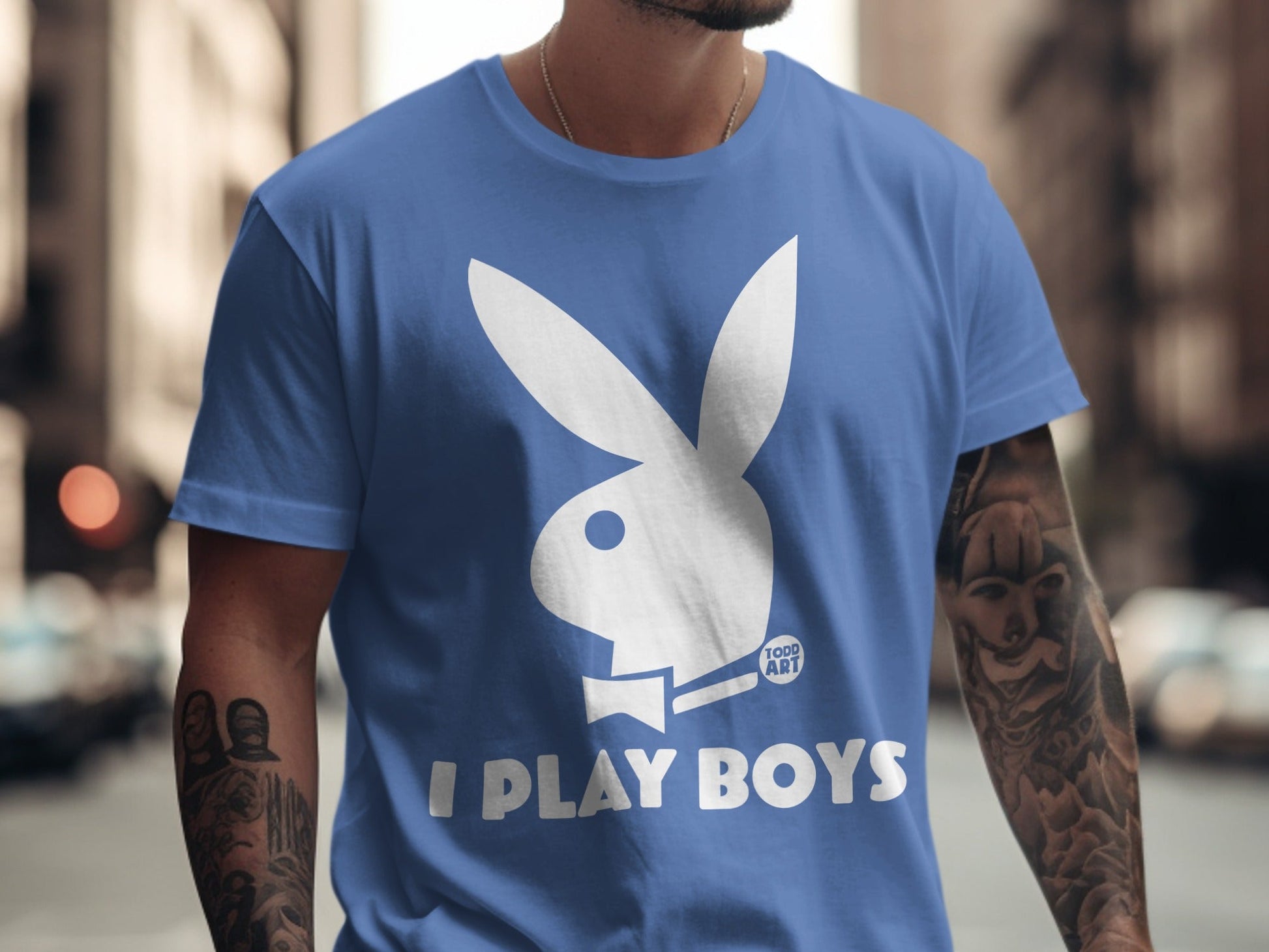 Blue t-shirt with white Playboy bunny logo and "I PLAY BOYS" text.