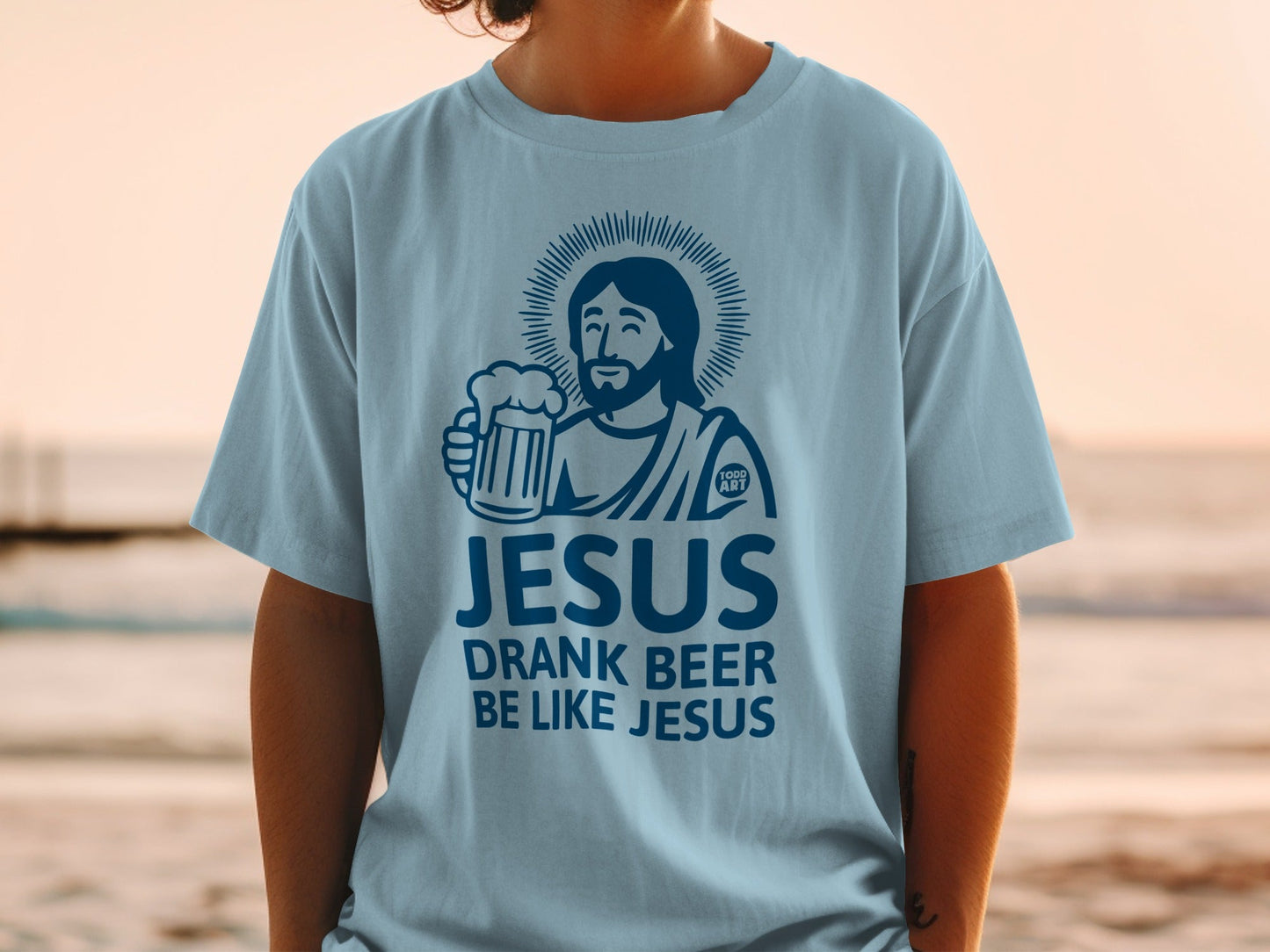 Light blue t-shirt with "Jesus Drank Beer" graphic and a beer mug.