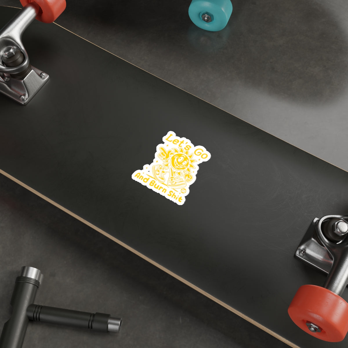 Let's Go And Burn Shit Sticker on Skateboard Deck