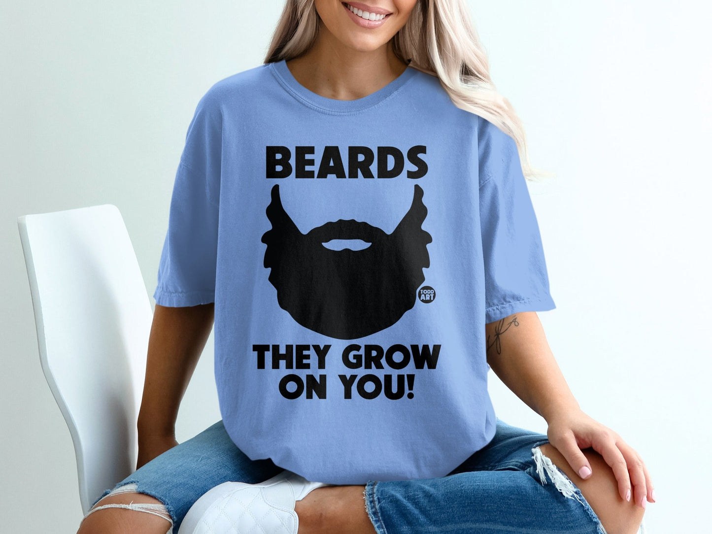 Blue t-shirt with black beard graphic and text BEARDS THEY GROW ON YOU!