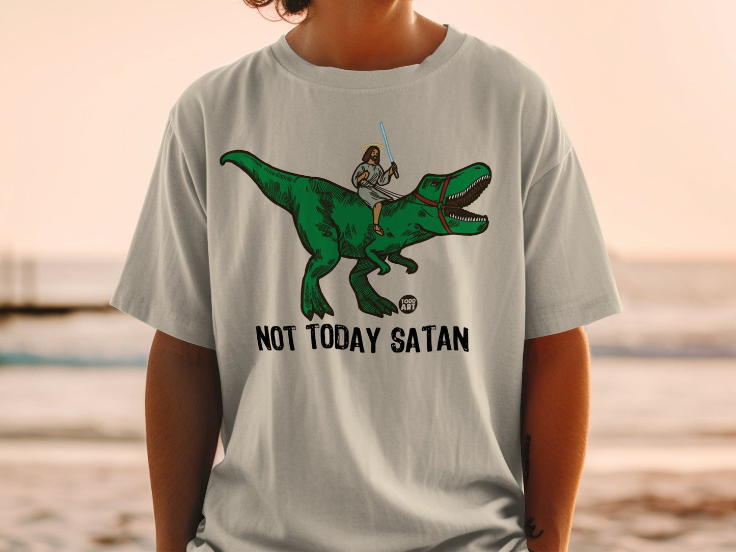Jesus riding a T-Rex with a lightsaber, text "NOT TODAY SATAN".