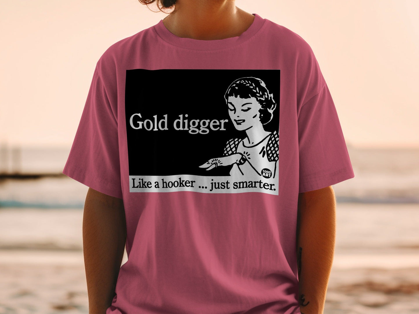 T-shirt with "Gold digger Like a hooker... just smarter." graphic.