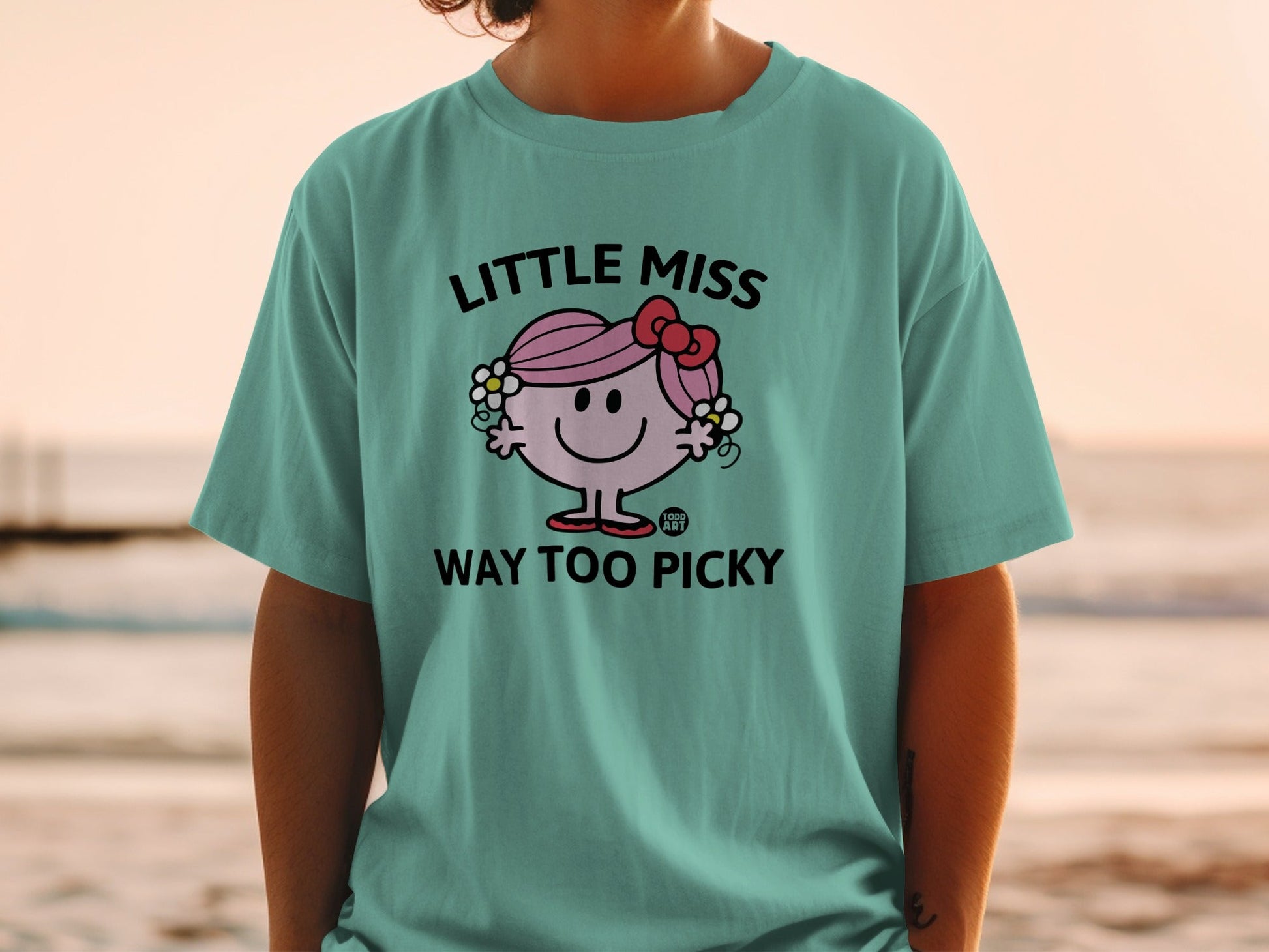 Teal t-shirt with "Little Miss Way Too Picky" text and illustration.