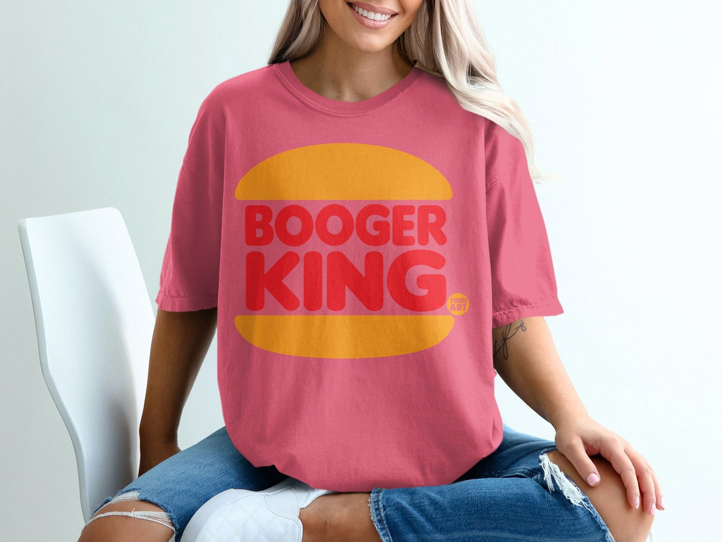 Pink t-shirt with "BOOGER KING" in orange text on a yellow burger graphic.