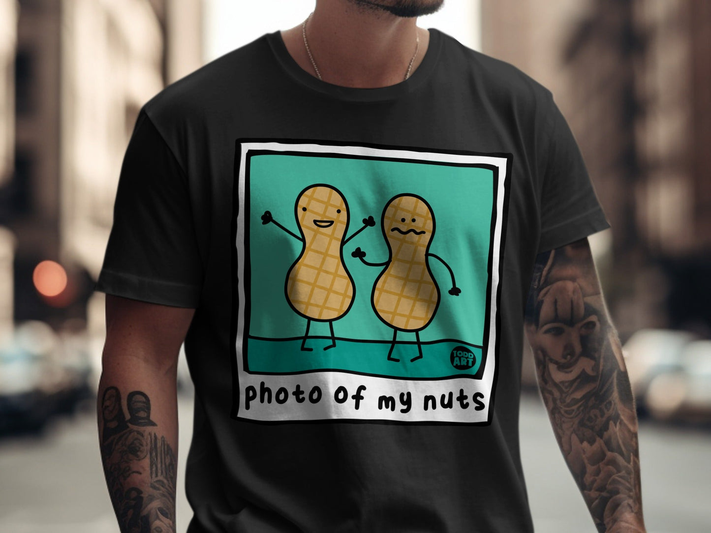 T-shirt featuring cartoon peanuts with happy and sad faces.