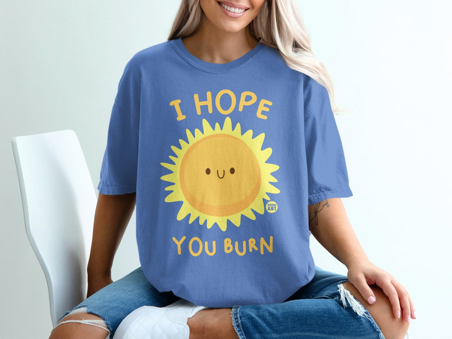 Blue t-shirt with a smiling sun graphic and "I HOPE YOU BURN" text.