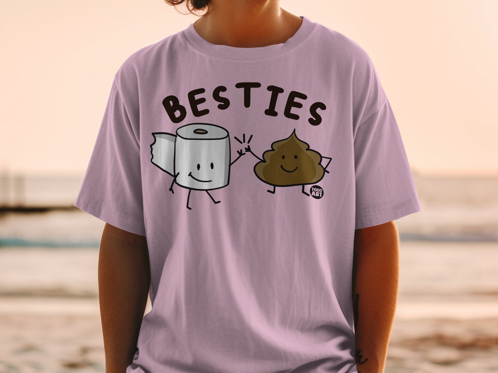 T-shirt with cartoon toilet paper and smiling poop characters, "BESTIES" text.