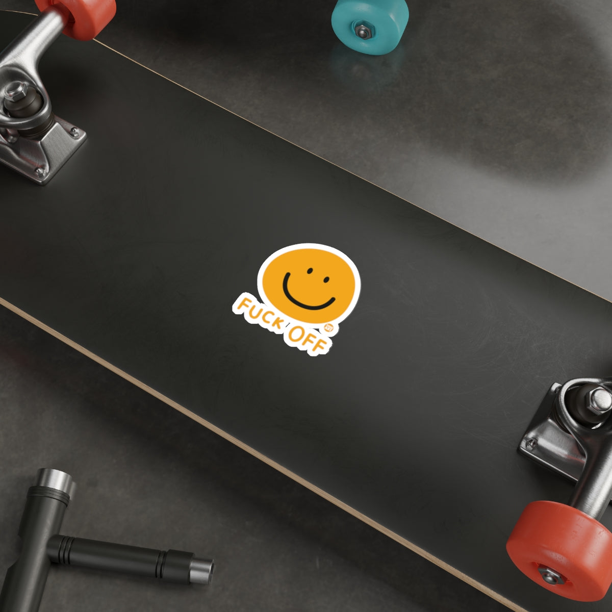 Smiley Face Fuck Off Sticker on Skateboard Deck