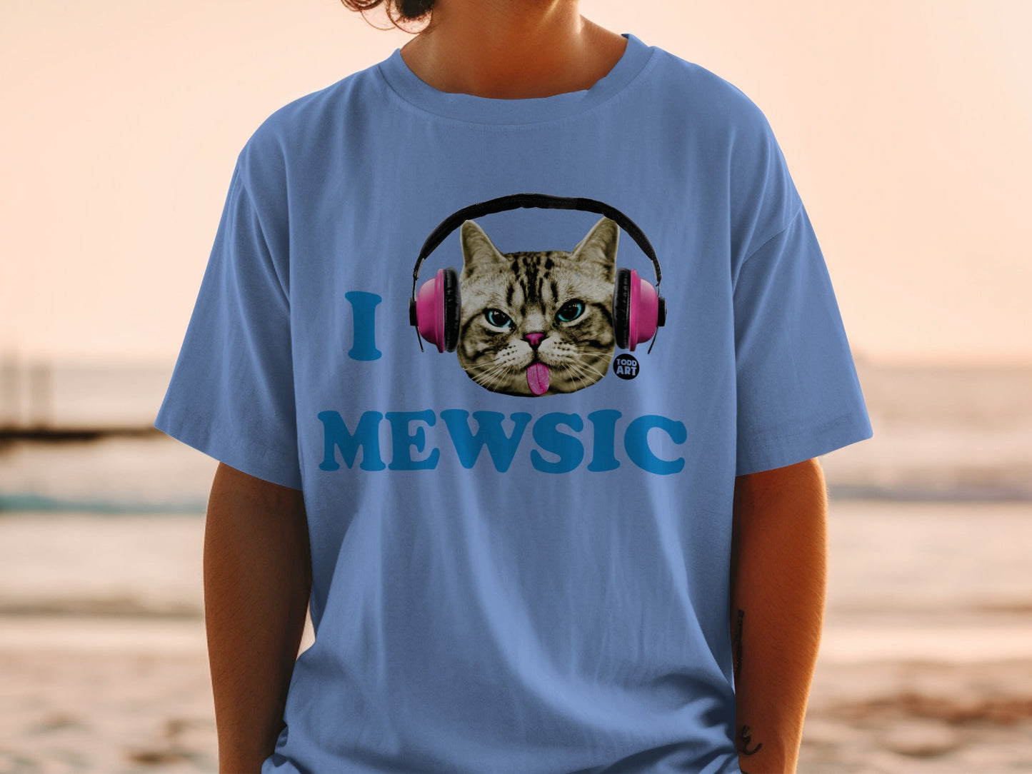 T-shirt with a cat wearing headphones and text "I MEWSIC"